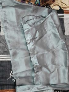 Greyish Blue Net Saree With Sequin Work And Tassel