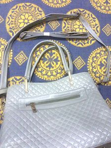 Beautiful Handbag With Extra  Long Strip