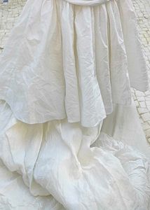 White Ruffled Mermaid Gown