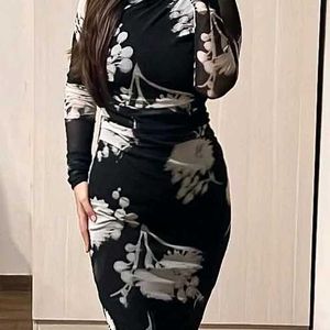 Black Doll Net Bodycon Dress.