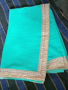 Plane Lux Green Saree With Mirror Work Lace