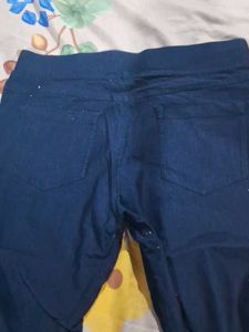 a navy blue jeans