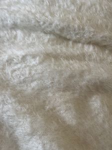 big white fuzzy sweater