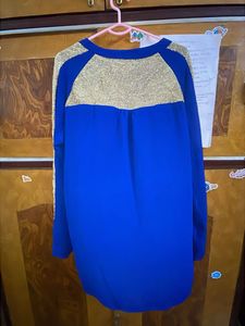 Full Sleeve Blue Top with Gold Detail In Hands