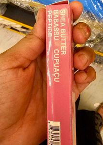 Rhode Peptide Lip Tint Along With Phone Case