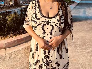 A Beautiful Dress With Black Embroidery...