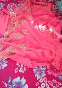 women peach color saree
