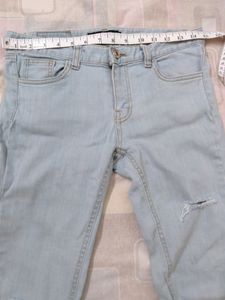 Low Waist Light Blue Ripped Jeans