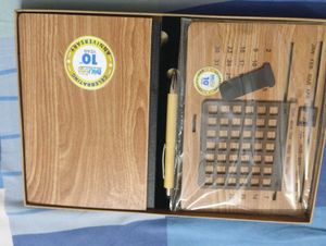 Absolutely new Wooden  Calendar ,pen and a woode