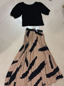 Chic Black Top & Patterned Skirt Set