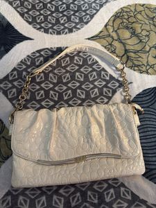 Elegant Off-White Clutch