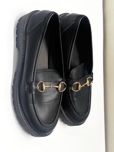Black Loafers with Gold Detail