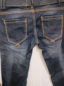 Distressed Denim Capri Pants