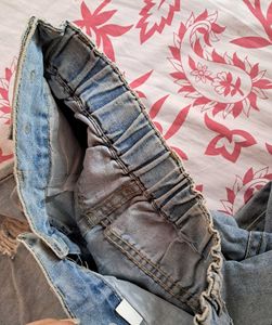 Distressed High-Waisted Denim Jeans