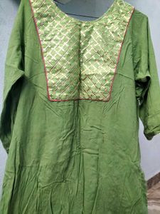 Green Kurta with a touch Of gotta patti.