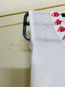 White Dress with Pink Embroidery