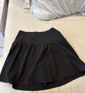 Black skirt with shorts underneath