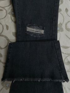 URBANIC HEAVY DISTRESSED BOOTCUT BLACK JEANS