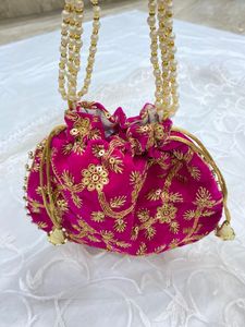 Beautiful Potli With Zari Work