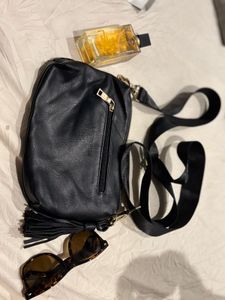 louenhide authentic sling bag