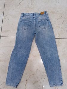Distressed Blue Jeans