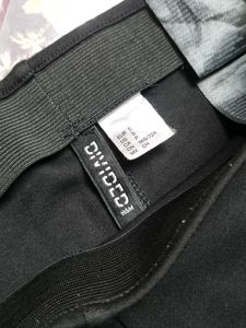 Striped Leggings with Red Accents