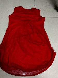 Red Sleeveless top.