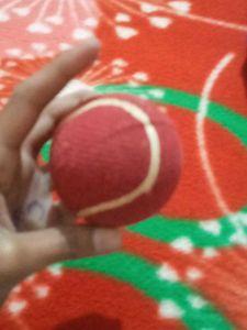 A laser red ball with box