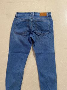 Ripped Blue Denim Jeans