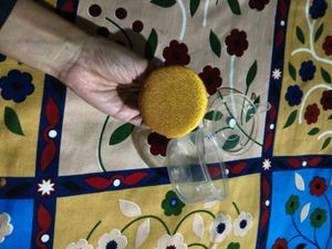 Powder puff with container