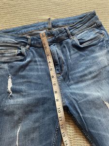 Distressed Slim Fit Jeans