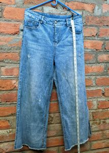 Light blue wide-leg jeans.