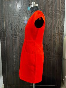 Red belted dress with scalloped neckline