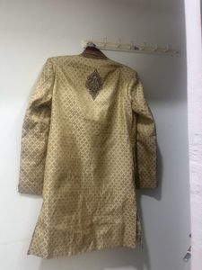 gold and maroon sherwani with shoes