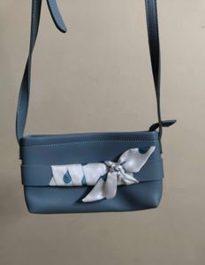 Sling Bag With Silk Like Scarf