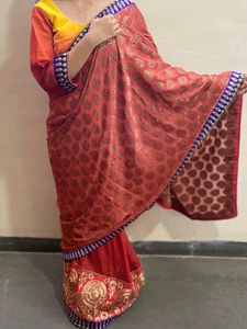 YELLOW ORANGE SHIFFON AND HEAVY EMBROIDERY SAREE