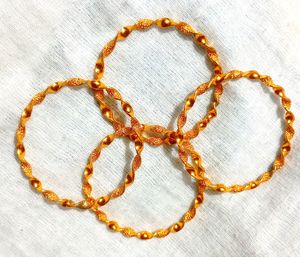 Golden Bangles (4 Pieces)