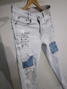 Distressed Denim Jeans