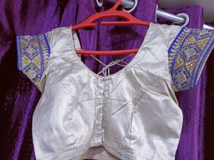Half net saree with stiched blouse and peticoat