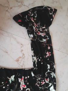 Peplum Top With  Pearl around The Neck