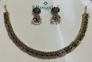 Black With Gold Neck Piece And Matching Jhumka