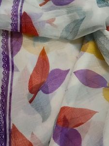 White Color Saree Colorfull Leaves Design. Georget Material.