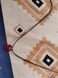 red heart y2k pendant with black cord