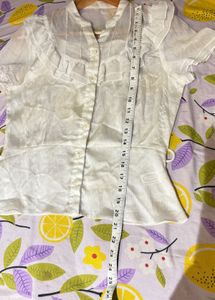 Elegant Ruffled Sheer Blouse