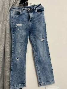 Ripped Blue Denim Jeans