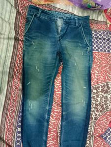 Distressed Blue Jeans
