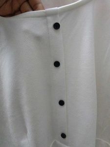 White Laser Cut Peplum Top
