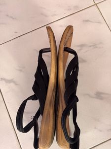 Stylish black strappy sandals