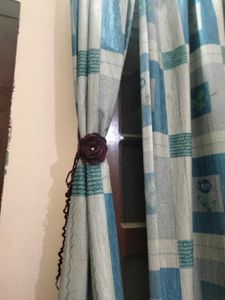 curtain holder brown colour