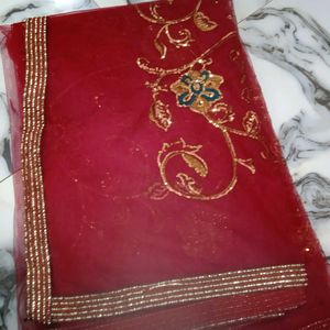 Embroidered Maroon net saree